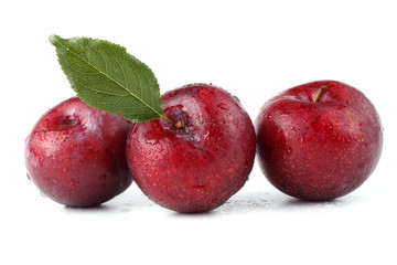 Plums with leaf