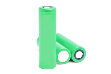 Three rechargeable batteries on a white background isolated. 18650 green batteries. device energy...