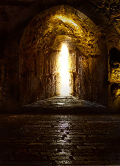 A medieval alcove and arrow hole illuminated in the midday sun at Ajloun Castle in Jordan
