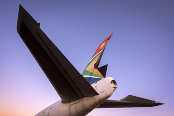 A close up tail shot of a retired South African Airways boeing taken at sunrise in Johannesburg, South Africa.