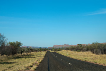 Fototapeta na wymiar Alice Springs Australia, view along Namatjira Drive with West MacDonnell Range in the distance