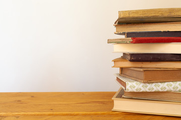 International book day, Sant Jordi, Literacy day. Old books on a wood surface