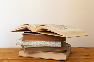 International book day, Sant Jordi, Literacy day. Old books on a wood surface