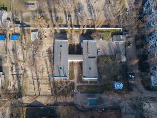 Aerial drone view, Kindergarten building with a playground