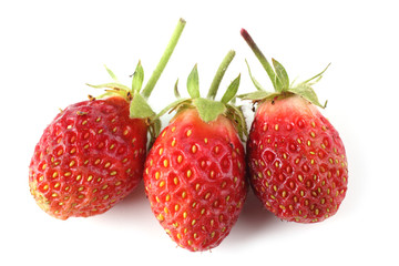 Three strawberries isolated on white