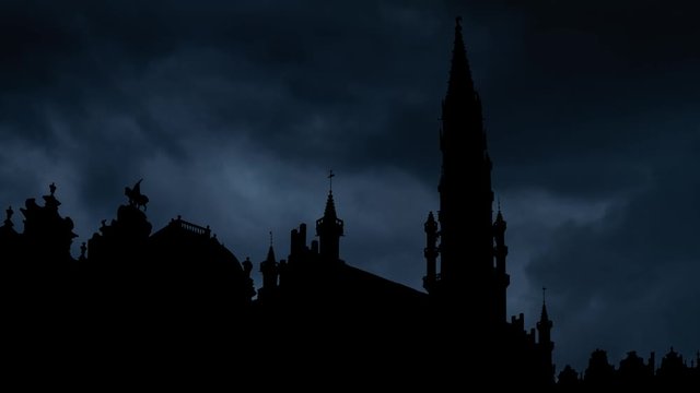 Hotel de Ville or Town Hall in Brussels, Thunderstorm and Lightning with Gothic Tower in Silhouette, Belgium