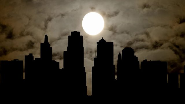 Kansas City: Time Lapse by Night with Full Moon and Dark Skyline of City, Missouri, USA