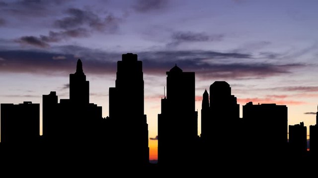 Kansas City: Time Lapse at Twilight with Colourful Sky and Dark Silhouette of Skyscrapers, Missouri, USA