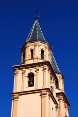 Fototapeta na wymiar View of the Church of our lady bell towers (iglesia parroquial nuestra senora de la expctacion), Orgiva, Spain.