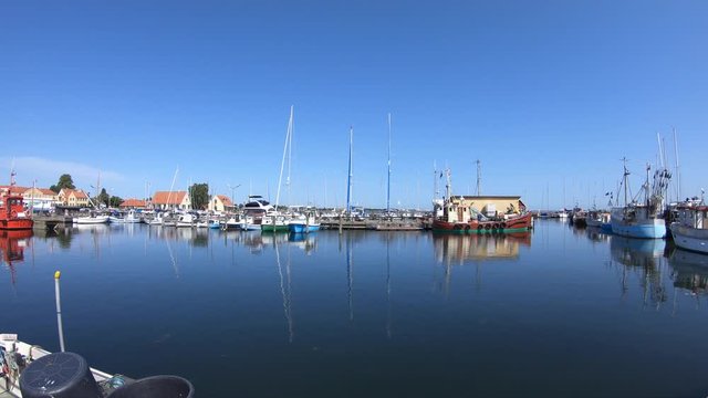 Marina in Dragør, Denmark With Beautiful Reflections and Sail Boats in the Still Water on a Sunny Clear Blue Sky Summer Day