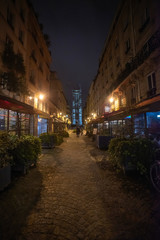 Fototapeta na wymiar The streets of Paris by the light of lanterns