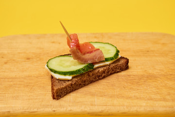 Red Trout Fish. Sandwiches with red fish. Sandwiches with trout or salmon, butter and cucumber.