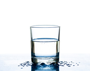 A glass of water on a white background.