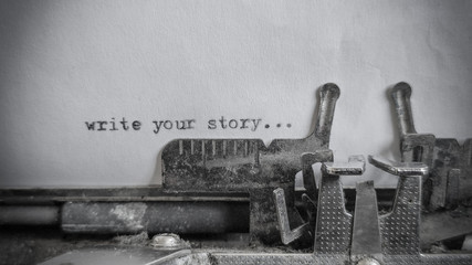write you story text typed on blank sheet with an old typewriter in vintage background - obrazy, fototapety, plakaty