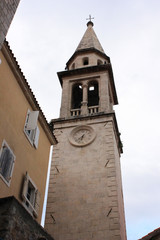 Fototapeta na wymiar Tower with clock 6 40 pm. Moment in history Montenegro