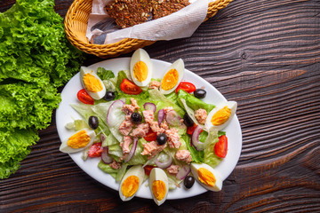 tuna salad on dark wooden rustic background
