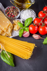 concept of traditional italian pasta with tomatoes and basil