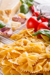 concept of traditional italian pasta with tomatoes and basil