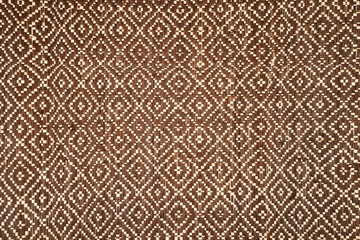 Handmade Loom woven placemat in brown color , weave texture for background ,product from Philippine