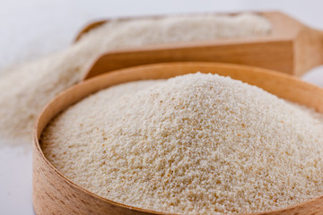 natural organic semolina on white acrylic background
