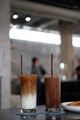 glass of  iced coffee on wooden table