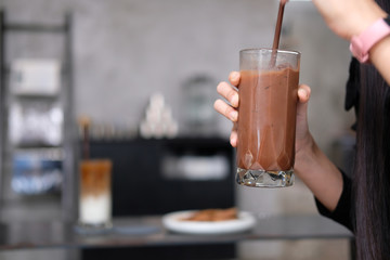 man drinking coffee in cafe