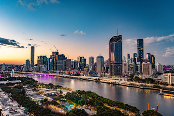 Fototapeta premium BRISBANE, AUSTRALIA - July 20 2019: Night time areal image of Brisbane CBD and South Bank.