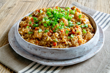 rice plov with chicken, mung bean and vegetables