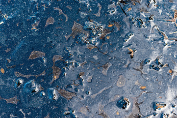 Unused asphalt left on grass floor, environment concept