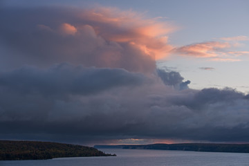 Autumn landscape at dawn of the shoreline of Lake Superior with passing storm, Pictured Rocks National Lakeshore, Michigan's Upper Peninsula, USA