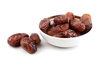 Date fruits isolated on white