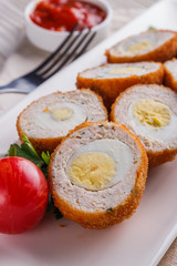 Scotch egg meat balls on rustic wooden background