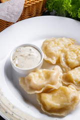 traditional Ukrainian dish of dumplings with sour cream