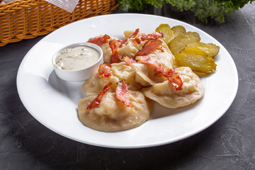 traditional Ukrainian dish of dumplings with sour cream