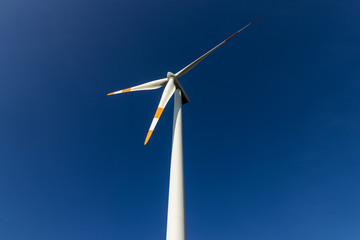 Wind turbine with blue sky