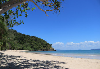 Picture of sandy beach of Mu Ko Lanta National Park, Krabi, Thailand with beautiful blue water and clear blue sky.