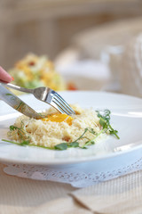 Appetizing carbonara paste on a white plate. Restaurant serving in the style of Provence