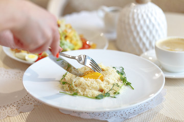Appetizing carbonara paste on a white plate. Restaurant serving in the style of Provence