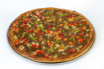 Meat pizza with vegetables and cheese