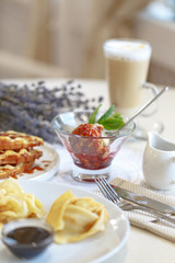 Appetizing gourmet dish fried ice cream dessert on the table in a restaurant in the style of Provence