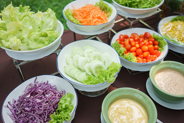 Salads are placed on the table with a notebook and a pen. To record food items or recipes Concept foodie Diet Food Review Weight Loss Diet