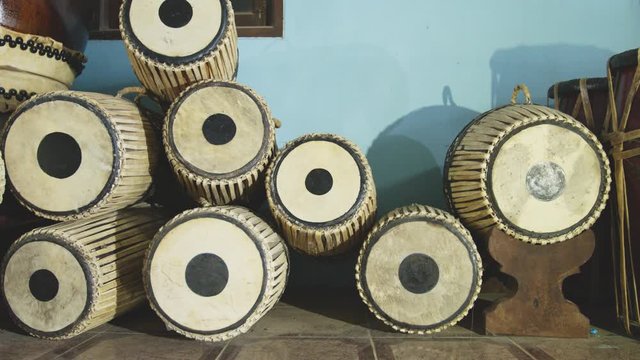 .The two side tabor drum used leather weaves around the drum so that the wood could not be seen. .The top had handles and the bottom had legs for placing..