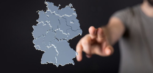 a virtual germany land  map digital in hand 3d