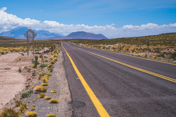 Scenic highway with mountains in the distance