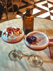 Two Sweet Cocktails in a bar alcohol