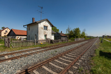 Fototapeta na wymiar Old house next to railway line in Germany
