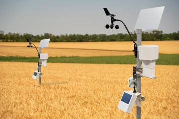 Weather station in a wheat field. Precision farming equipment