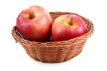 Apples on wicker plate