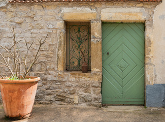 Fototapeta na wymiar old weathered wooden door and window