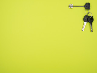 A bunch of keys on a green background.